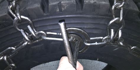 skidsteer chain tightening forum